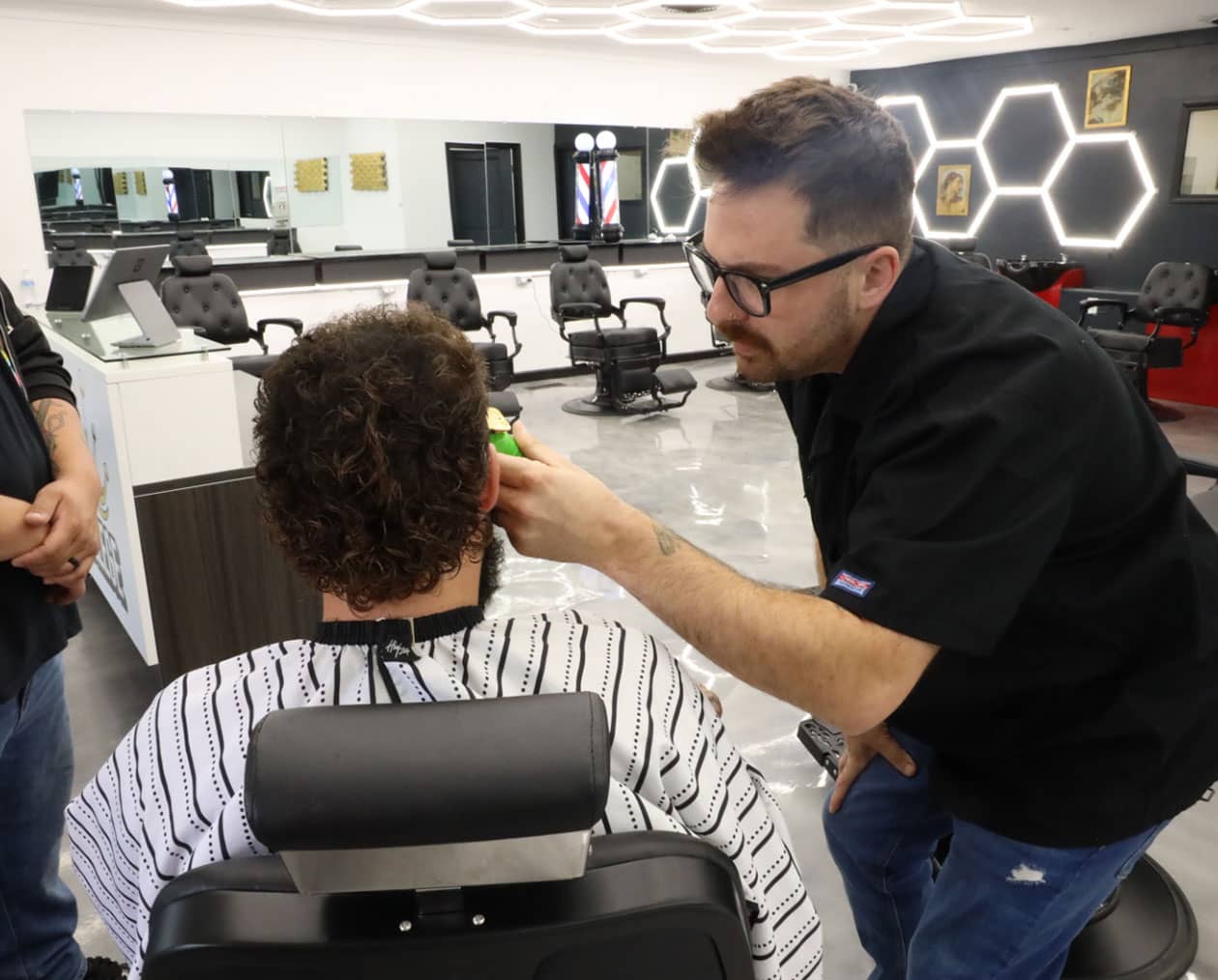 person getting hair cut